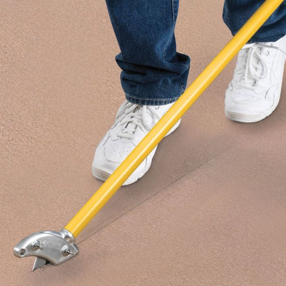 Crain 265 Stand-Up Cutter cutting carpet.